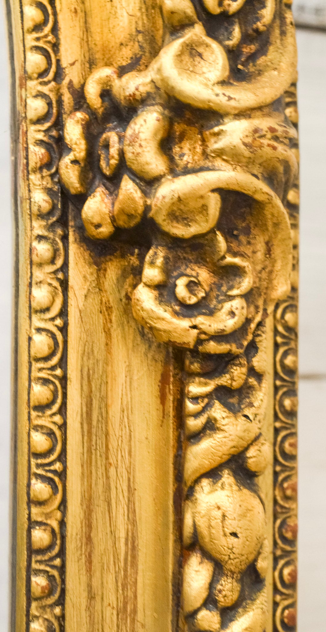 Putti Crowned Gilt Framed Beveled Mirror