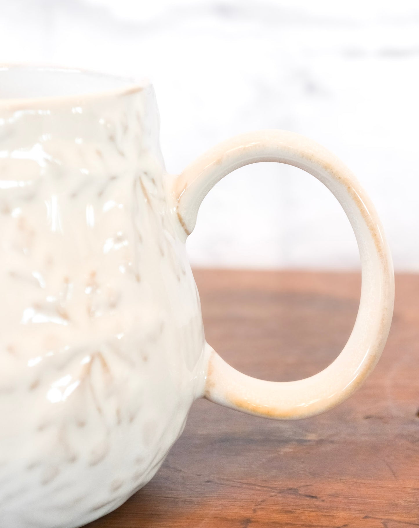 Stoneware Embossed Snowflake Mug
