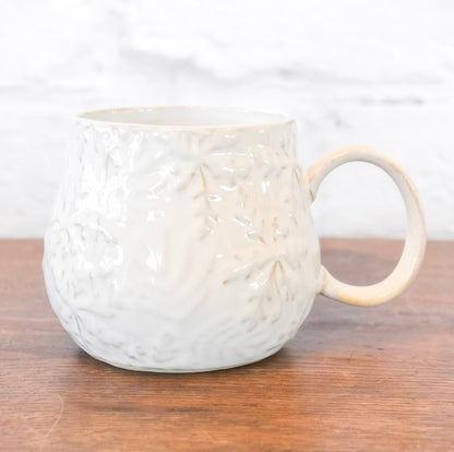 Stoneware Embossed Snowflake Mug