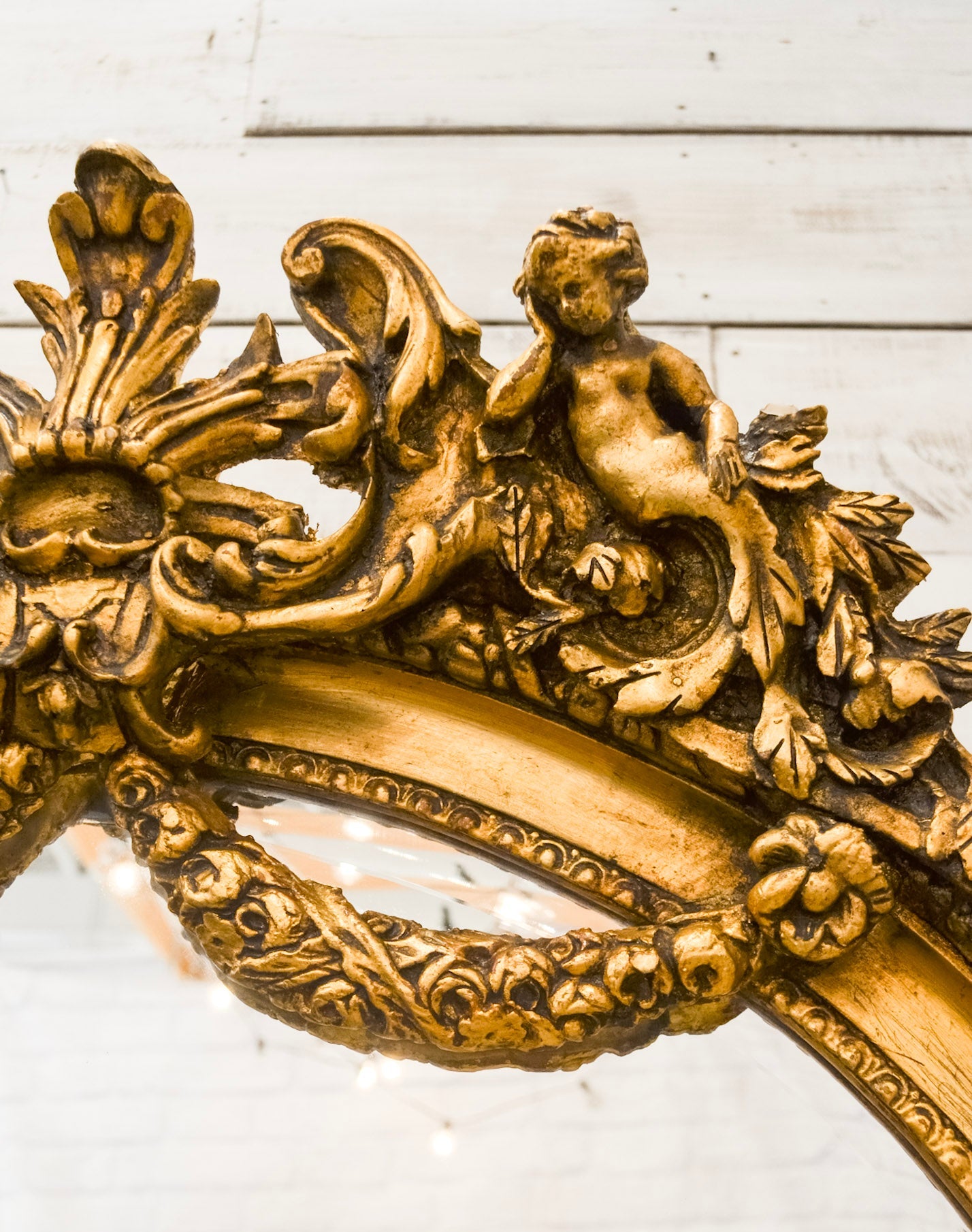 Putti Crowned Gilt Framed Beveled Mirror