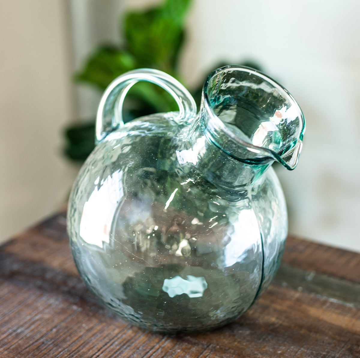 Small Mouthed Round Tilted Pitcher